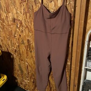One Piece Jumpsuit Is Wear Underneath Or Alone